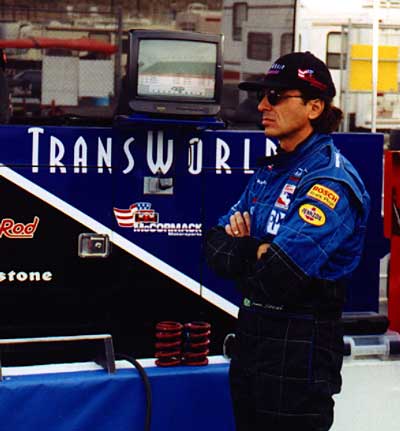 Raul Boesel standing on pit lane