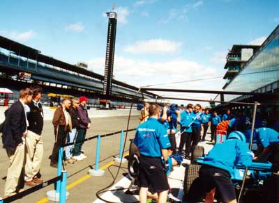 Sam and Bob watch pit stop practice