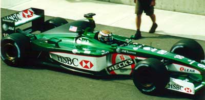 Eddie Irvine in a Jaguar